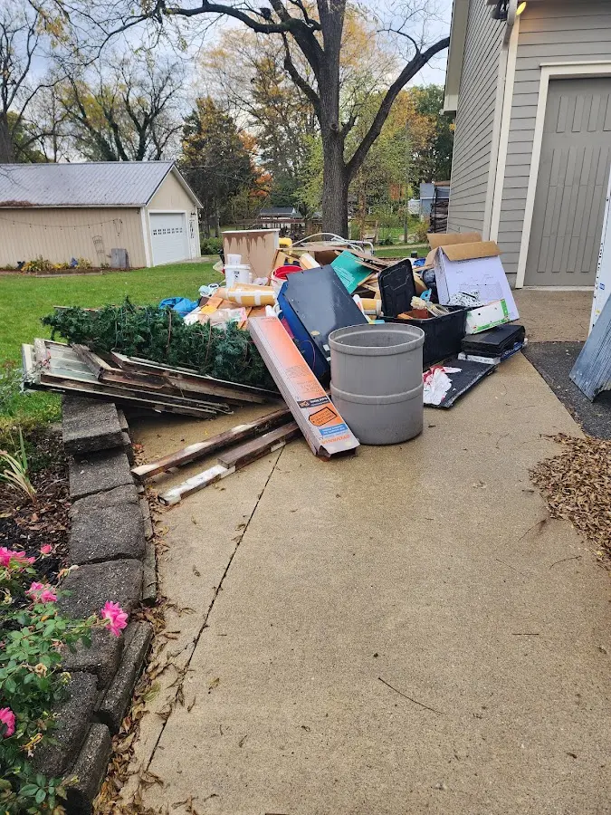 Dumpster being loaded with debris for 3 Yard Dumpster Rental in Redondo Beach